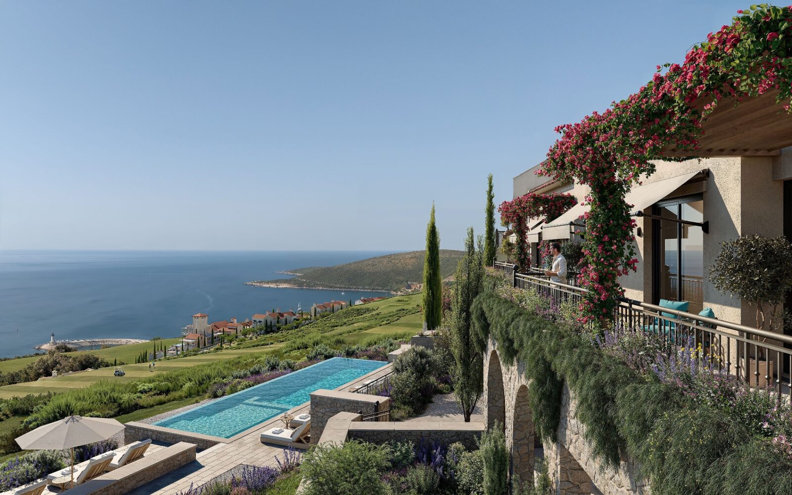 The Peaks golf residences at Luštica Bay, Montenegro - hillside terrace with infinity pool overlooking the Adriatic Sea and Marina Village.