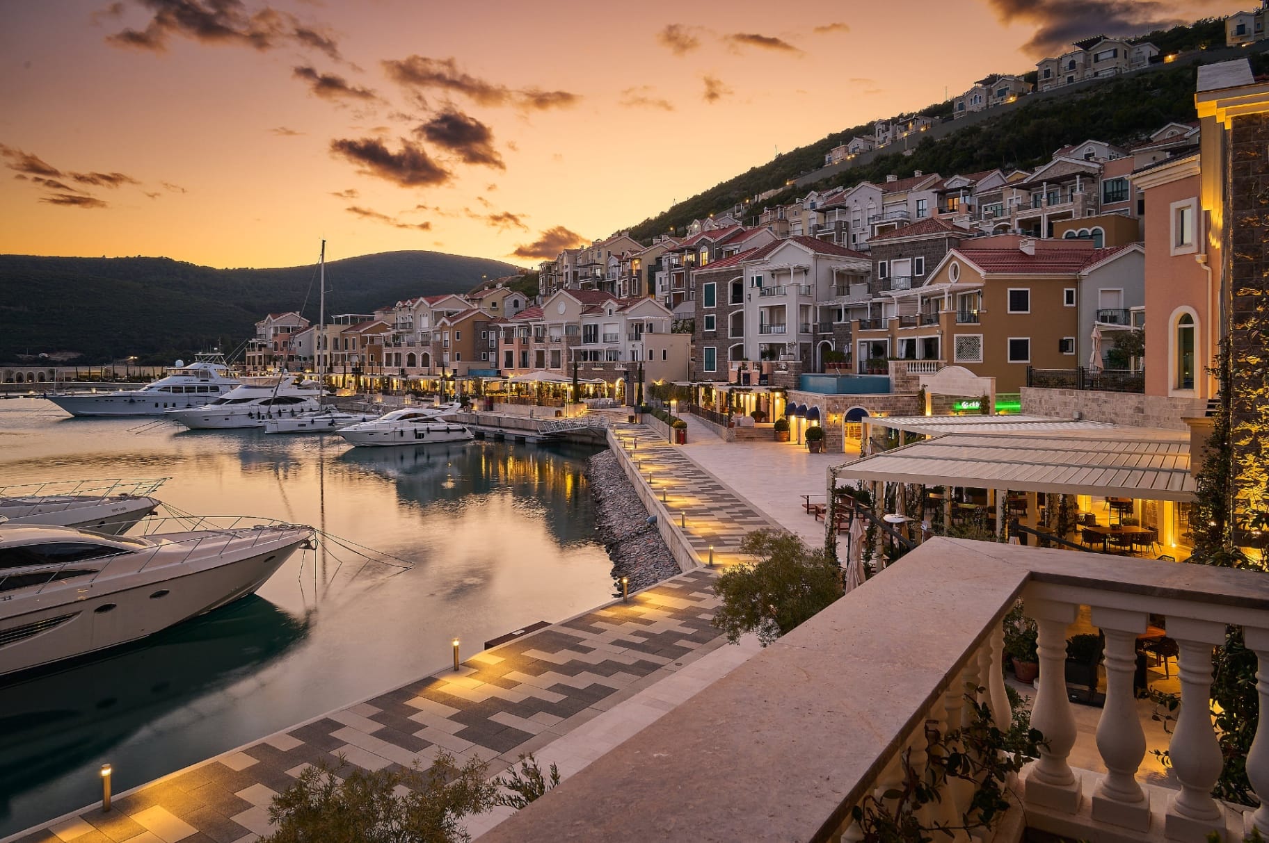 Marina Village at Luštica Bay at golden hour - which neighbourhood to buy in guide