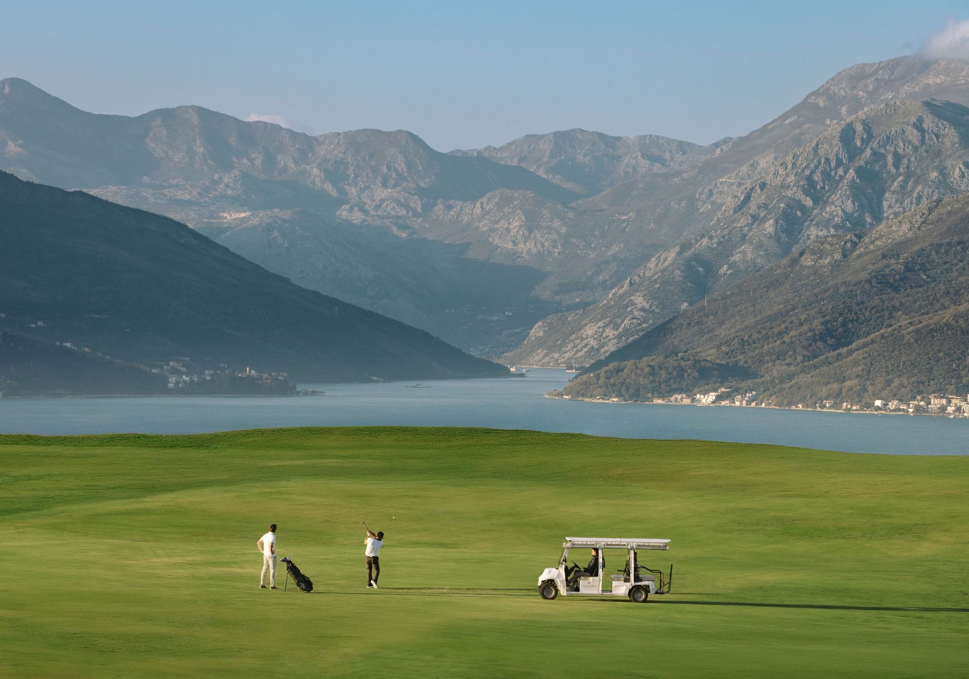 Golf course overlooking Boka Bay and mountains - buying property in Montenegro guide